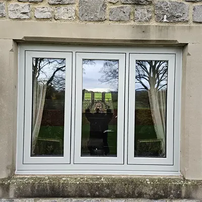 The reflection of a person in a window.